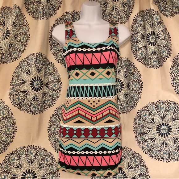 Dresses & Skirts - NWOT. Printed mini dress.
